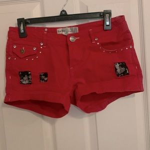Red jean shorts black lace detail